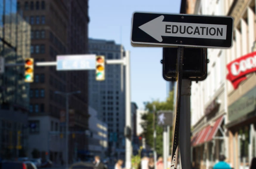 a picture of a one way sign with the word EDUCATION written on it
