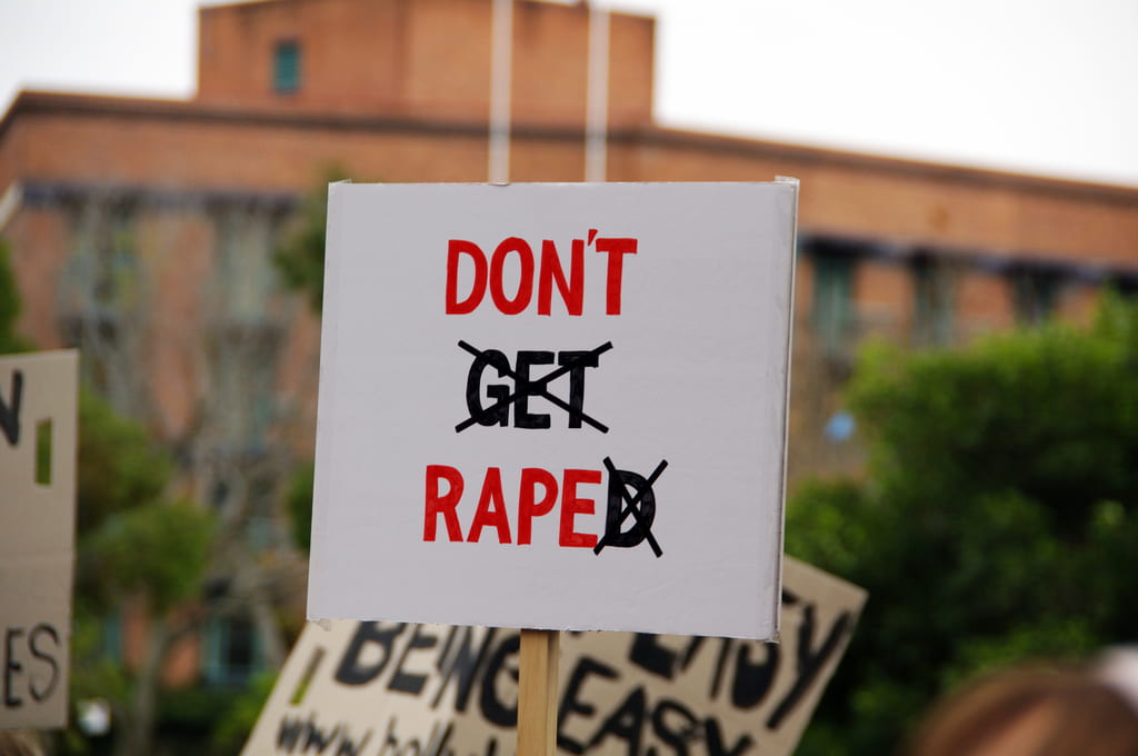a sign that reads don't rape