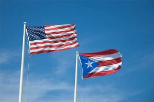 A picture of the American and Puerto Rican Flag