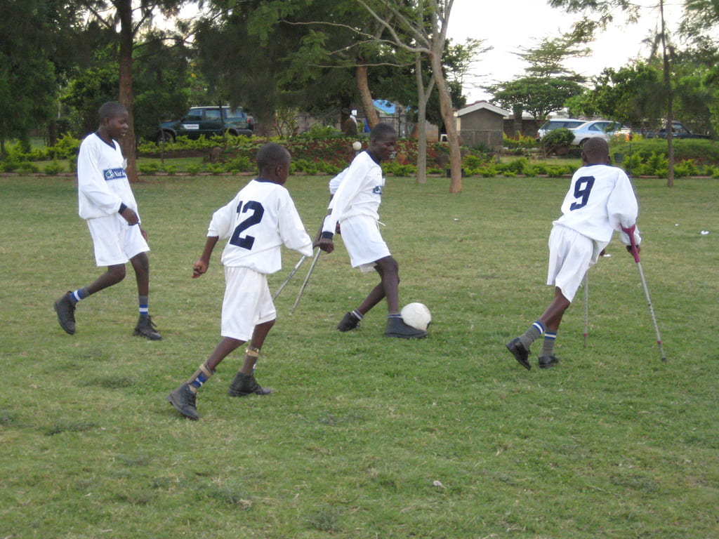 boys with physical disability playing soccer