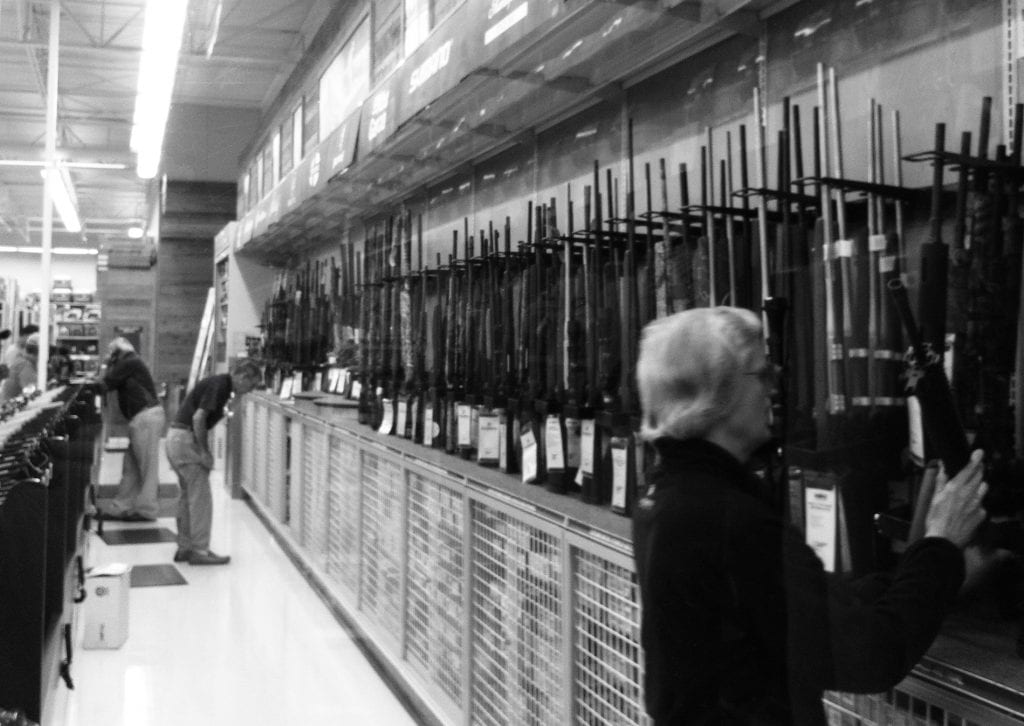 a photo of a gun store rack