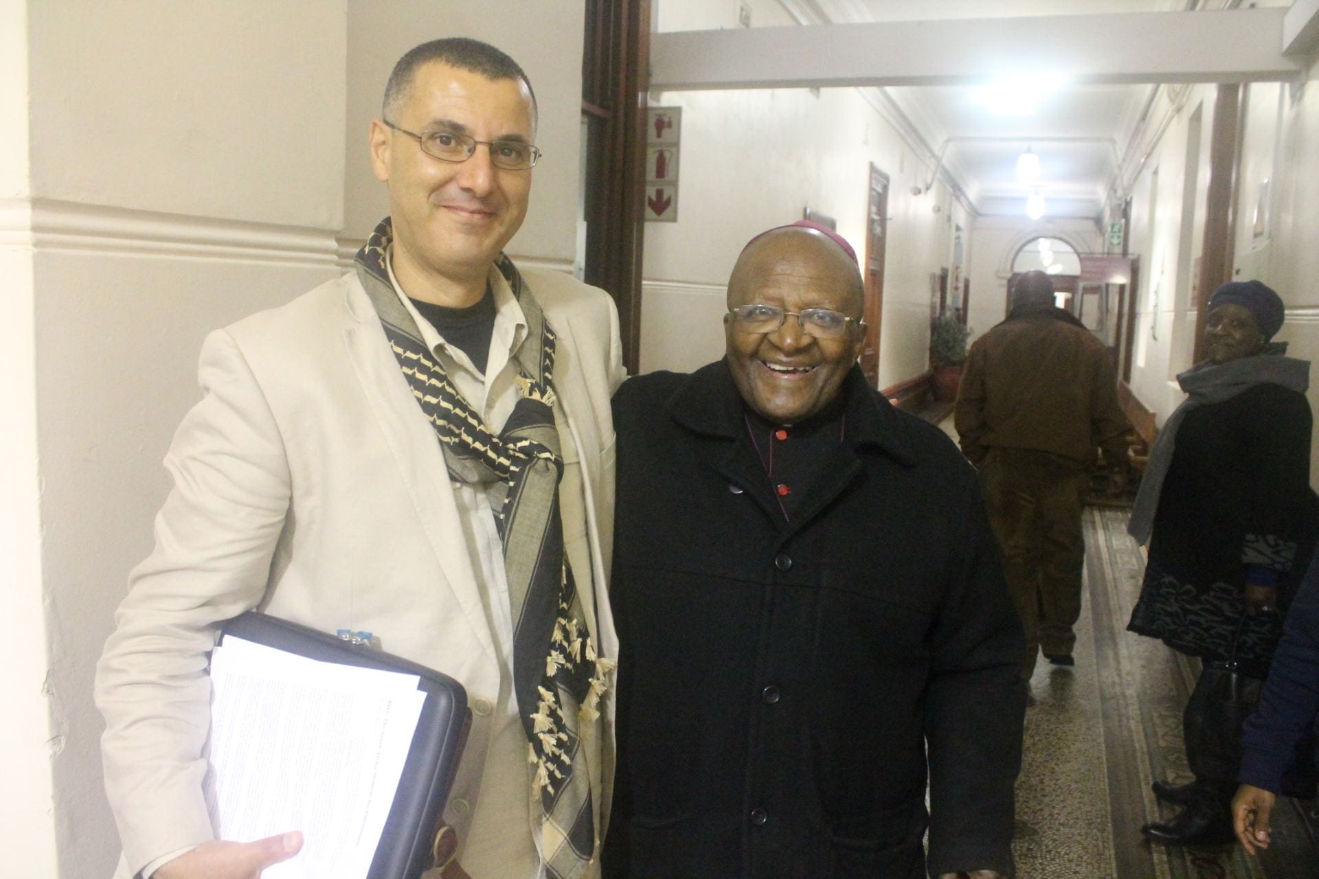 Peace activist Archbishop Desmond Tutu with Palestinian activist Omar Barghouti