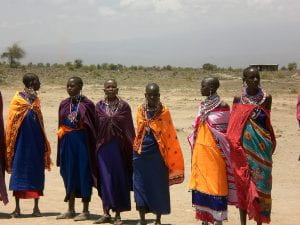 A group of girls dressed in traditional Masaai clothing