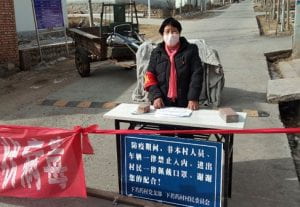 Yan Shenglian volunteered along with 28,000 rural women to monitor COVID-19 in her village. Source: Yahoo Images.