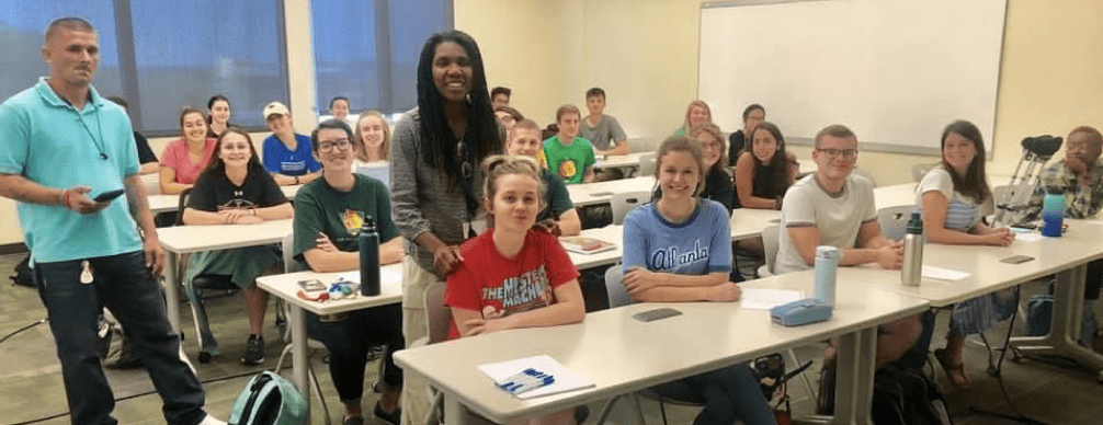 Photo of Dena Dickerson and students in class