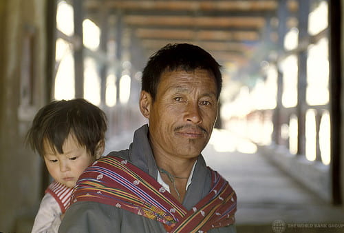  Bhutanese man with child