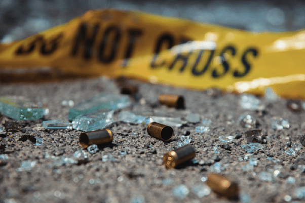 Bullet casings and crime scene tape