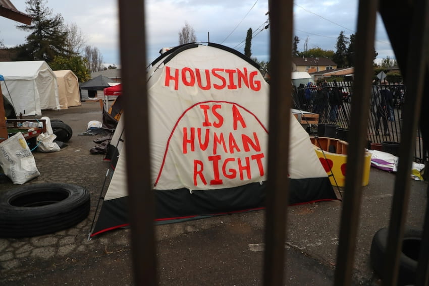 Tent that says Housing is a Human Right