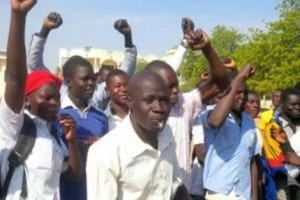 Demonstrators raise fists in defiance of Chad government