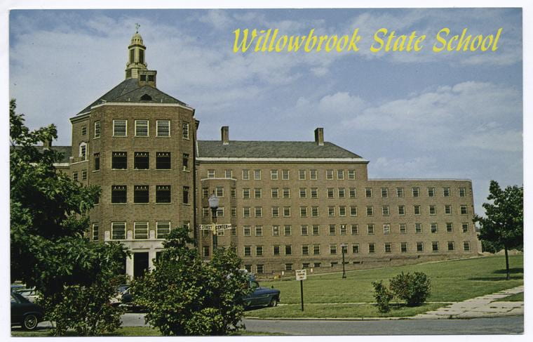 Postcard of Willowbrook with a yellow label stating "Willowbrook State School". Source: New York Public Library Digital Collection