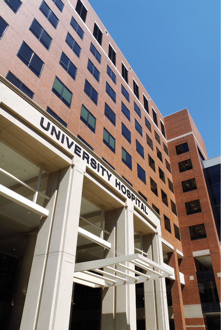 Alternate Text: Photo of a University of Alabama at Birmingham building, displaying the words “University Hospital.” Source: Flickr