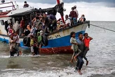 Figure 3 Rohingya landing on the shores of Indonesia. Source: Yahoo Images