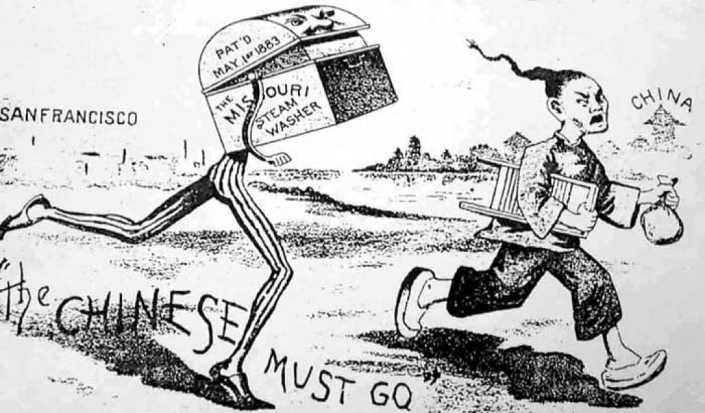 With the quote "the Chinese must go," an American figure with long legs labeled 'the Missouri Steam Washer' chases away a Chinese man representing the competition of immigrant businesses. The fleeing man clutches a stool and a container of opium.