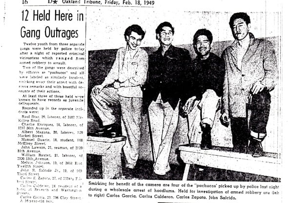 The paper shows four of twelve youth arrested for gang-related criminal activity amonst the outrage of the Zoot Suit Riots.