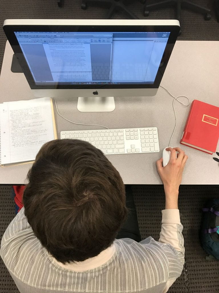 student working at desktop